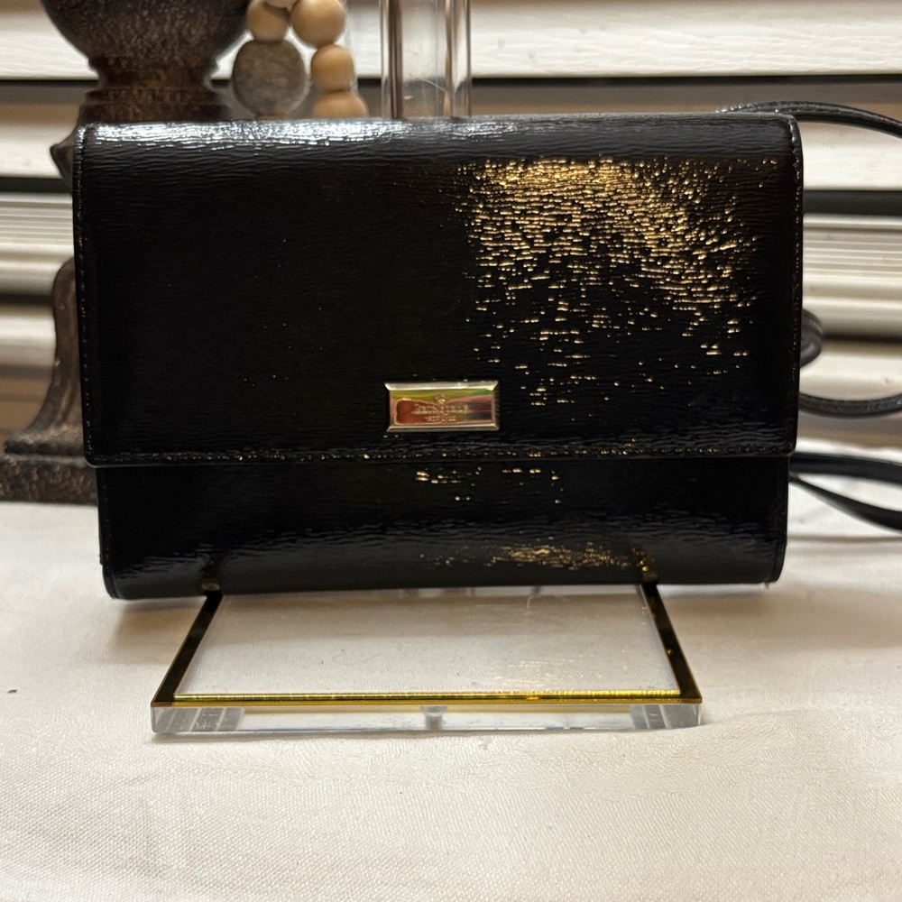 Kate Spade Black and Gold Wristlet
